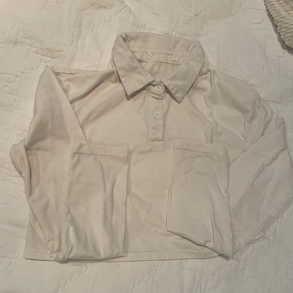 white long sleeve crop top halfway button up